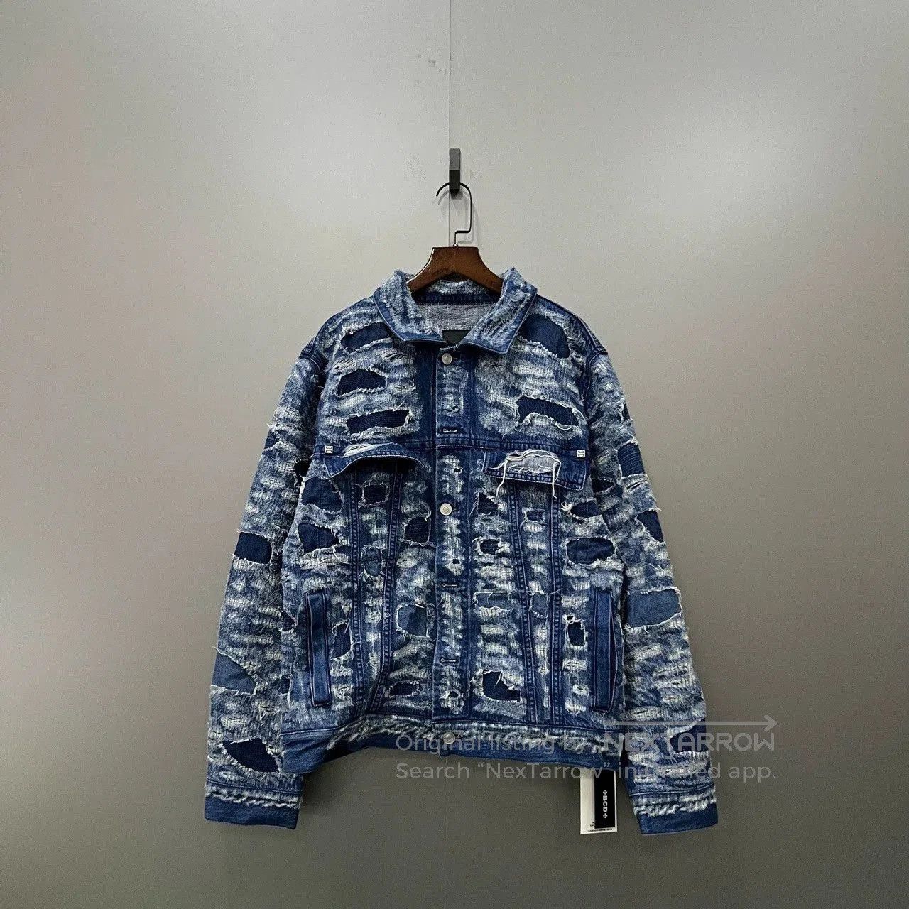 givenchy distressed denim jacket in size medium.