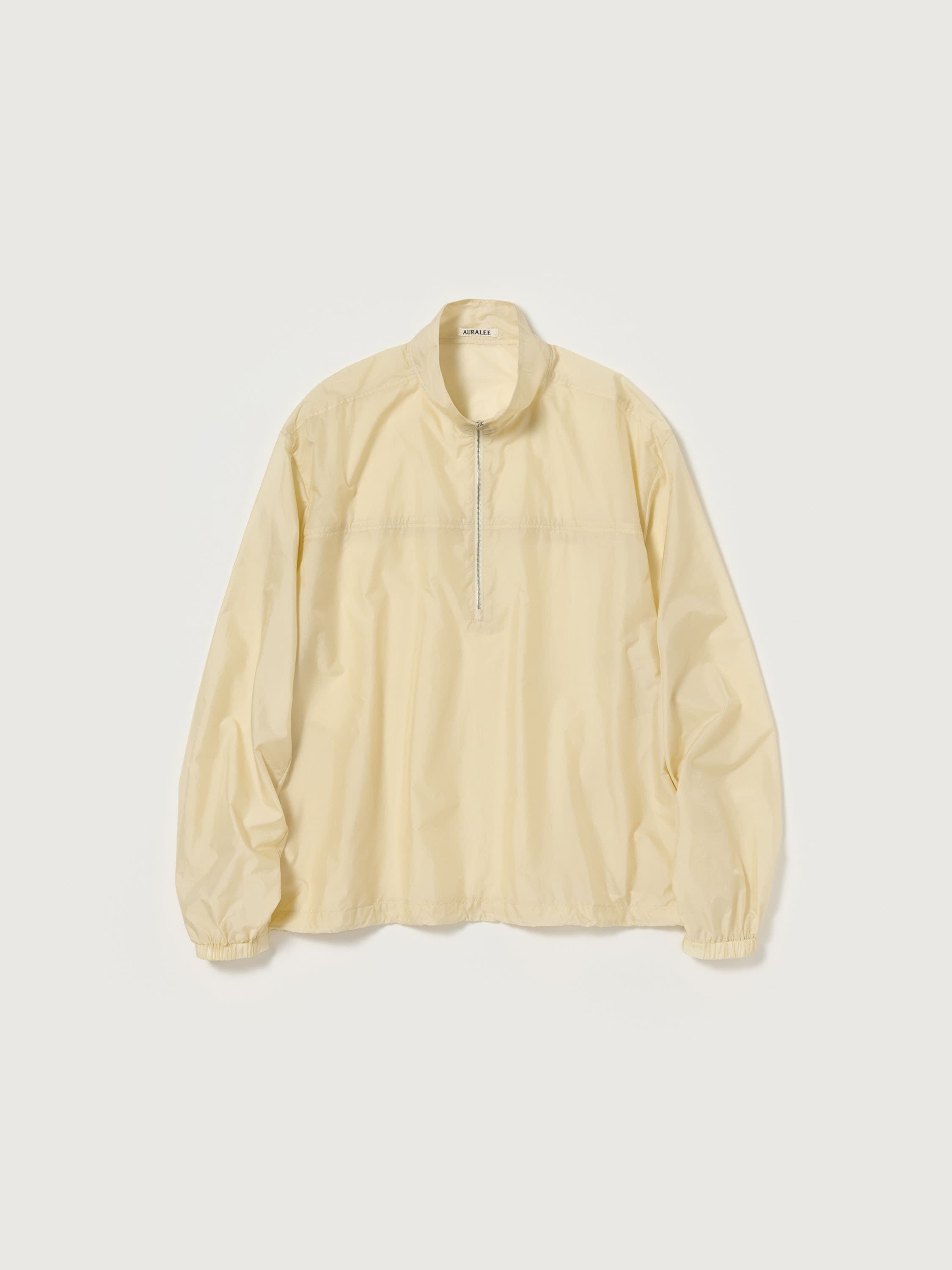 Auralee Yellow Light Nylon Half Zip p/o | Grailed