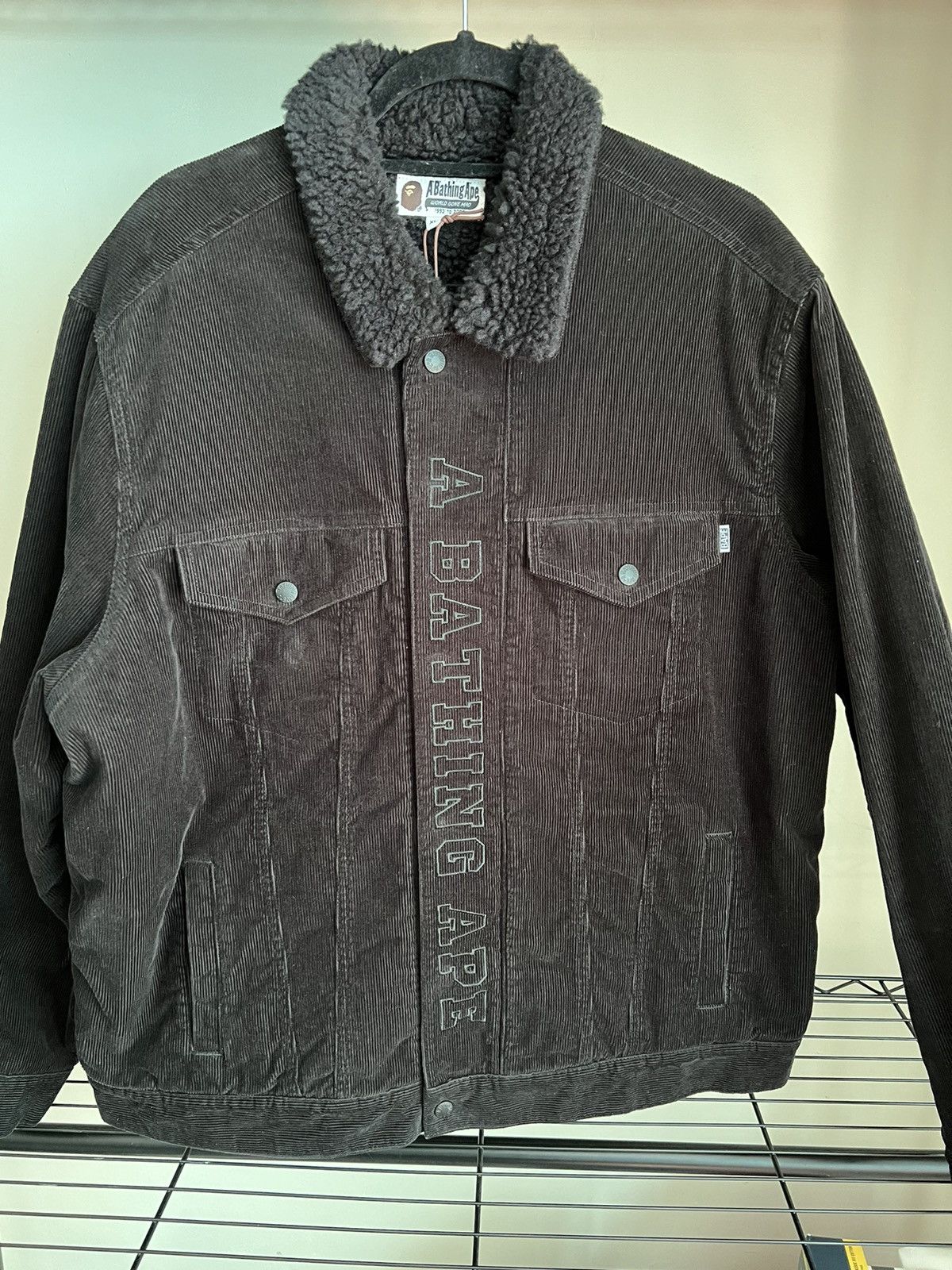 image of Bape A Bathing Ape Boa Corduroy Wide Trucker Jacket in Black, Men's (Size XL)