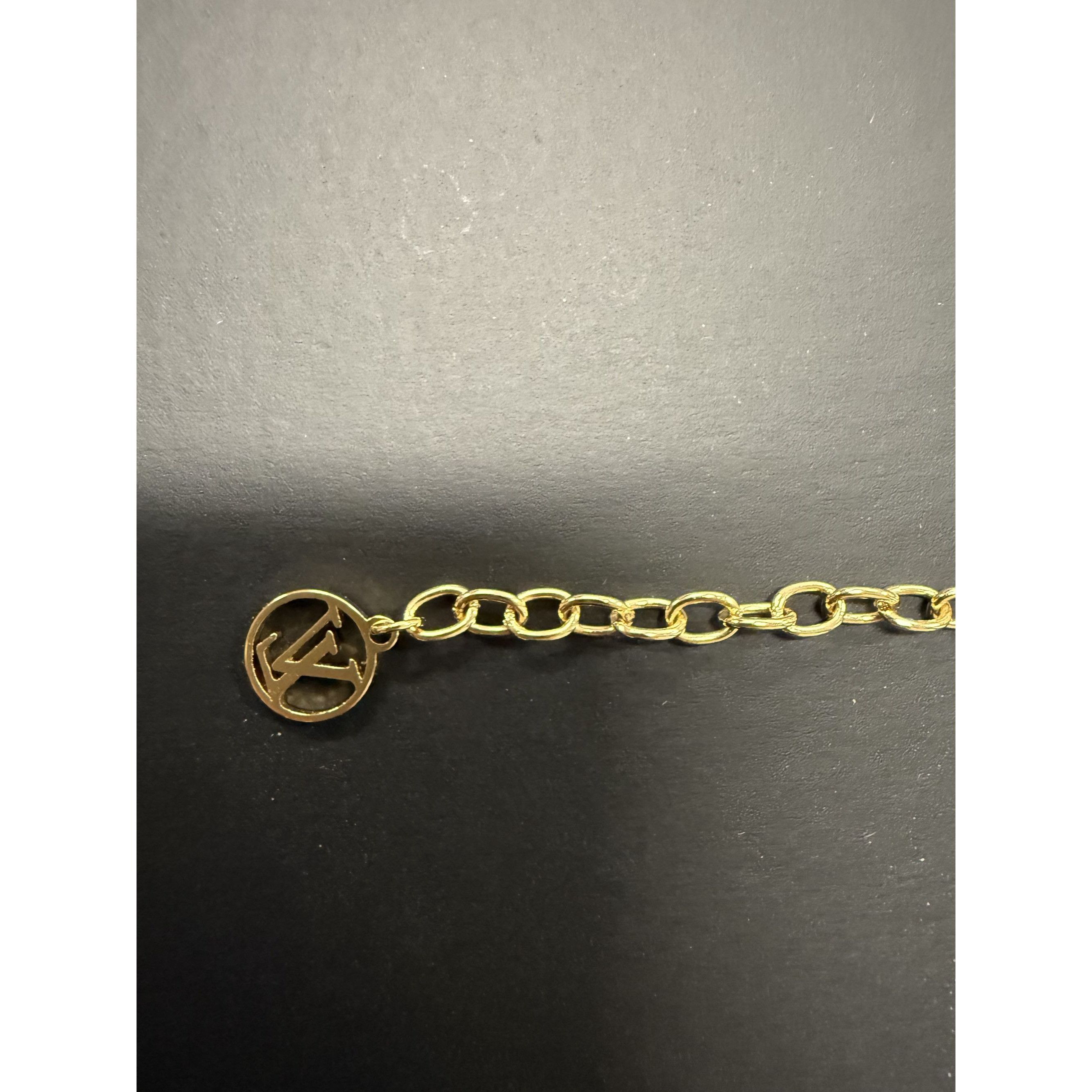 Louis Vuitton Louis Vuitton Gold-Tone Bracelet With LV Logo & Flower Charm Size ONE SIZE - 6 Thumbnail