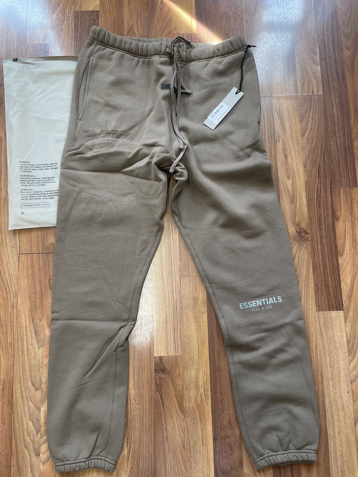 image of Fear Of God Essentials Size Large Sweatpants Harvest in Brown, Men's