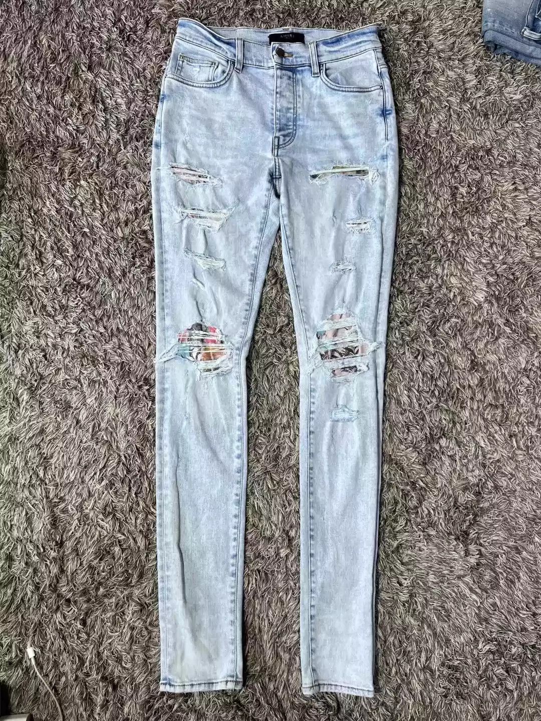image of Amiri New Light Coconut Patchwork Knife Cut Jeans in Blue, Men's (Size 32)