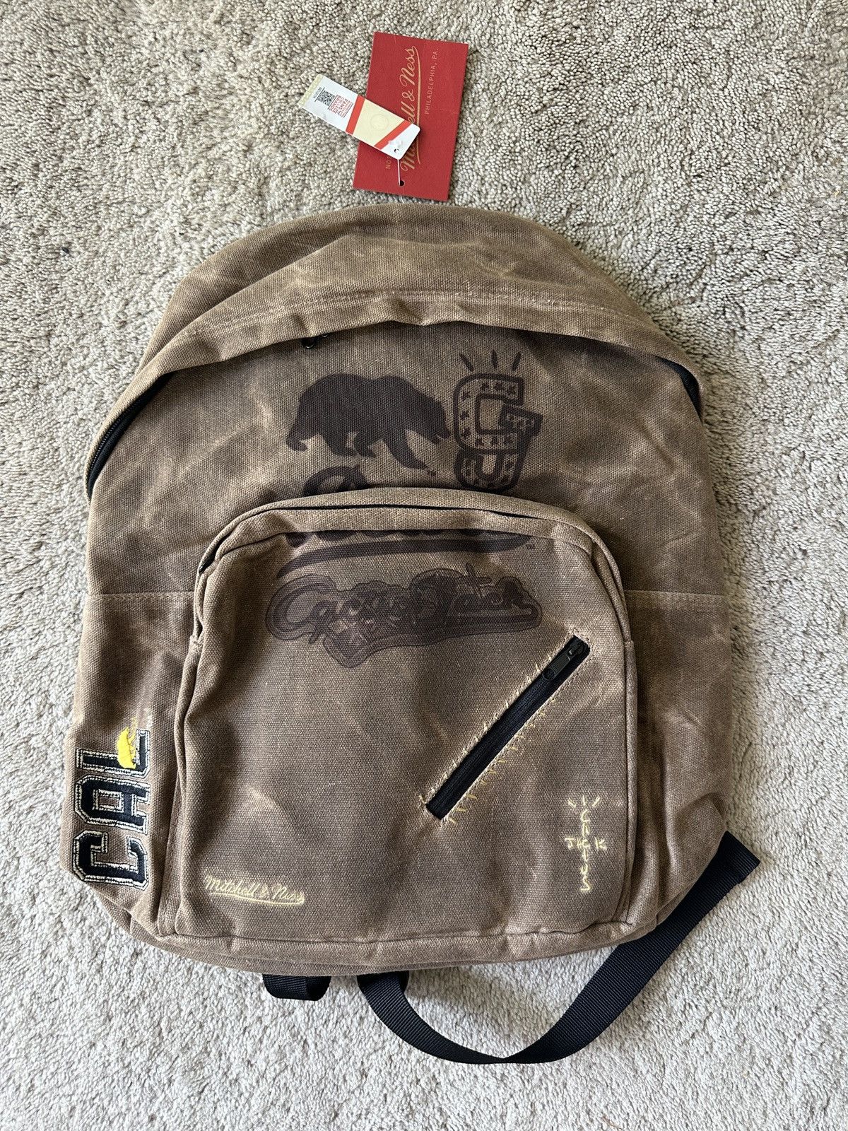 image of Mitchell Ness x Travis Scott Cactus Jack X Mitchell & Ness Cal Berkeley Backpack in Brown, Men's