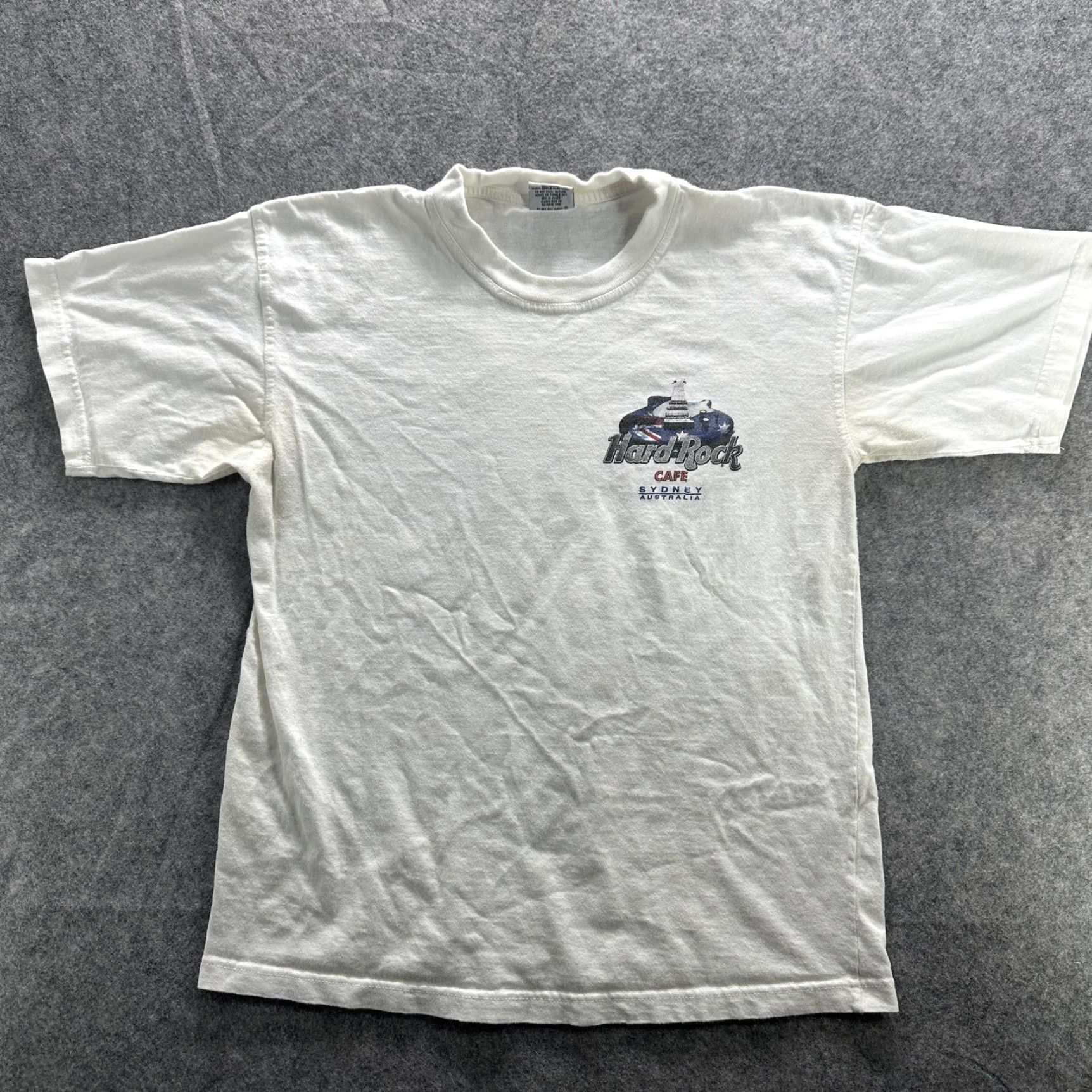 Hard Rock Cafe VINTAGE Hard Rock Cafe Shirt Mens Small White Sydney Australia 90s Guitar Rock Music Graphic Print Crew Neck Short Sleeve Cotton T-Shirt Size US S / EU 44-46 / 1 - 2 Thumbnail