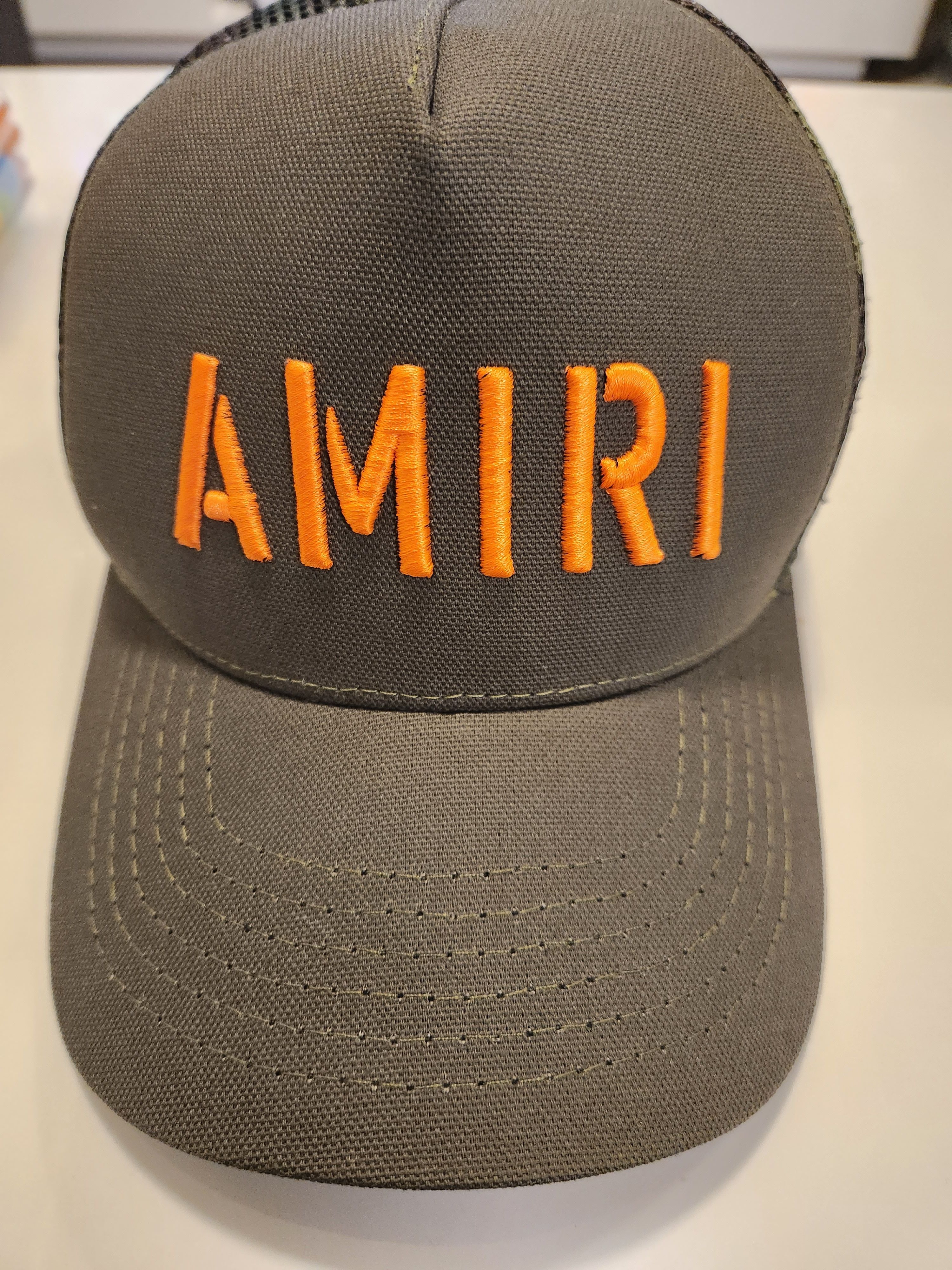 Amiri AMIRI olive green/orange stencil camo trucker hat Size ONE SIZE - 2 Thumbnail