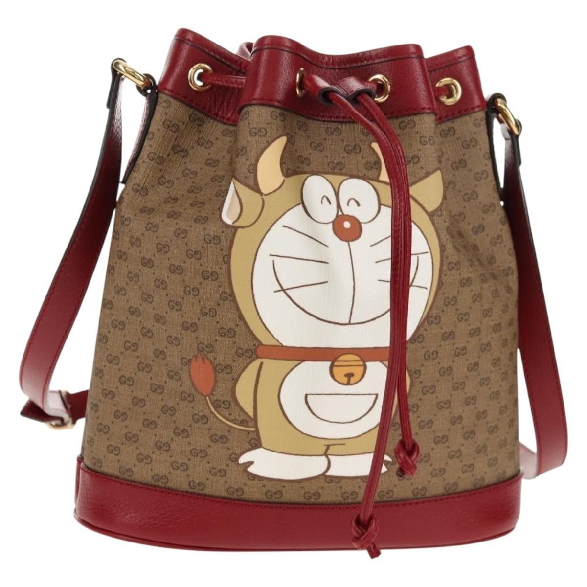 Gucci Gucci Doraemon Bucket Bag Printed Mini GG Coated Canvas Size ONE SIZE - 1 Thumbnail