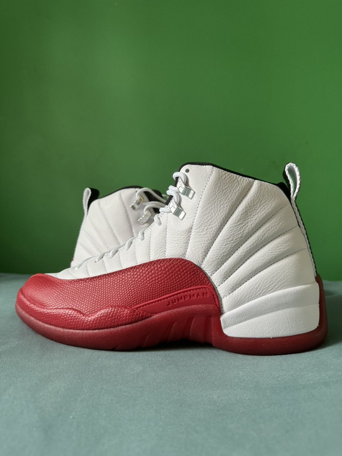 image of Nike Air Jordan 12 Cherry 2023 Shoes in Red, Men's