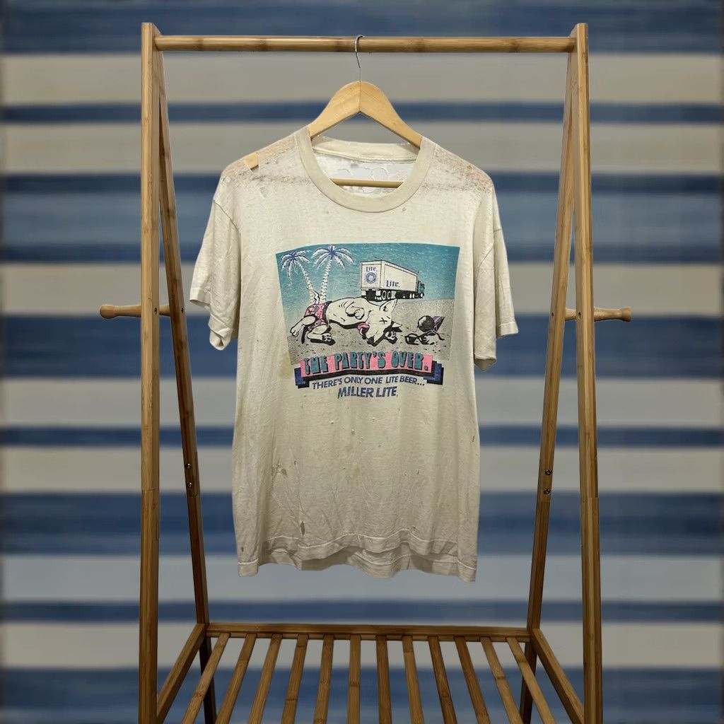 Vintage VTG Miller Lite Party Over Dead Spuds Mackenzie Paper Thin Thrashed T-Shirt XL Shirt Mens White Distressed Burnout 80s Beer Dog Budweiser"} Size US XL / EU 56 / 4 - 1 Thumbnail