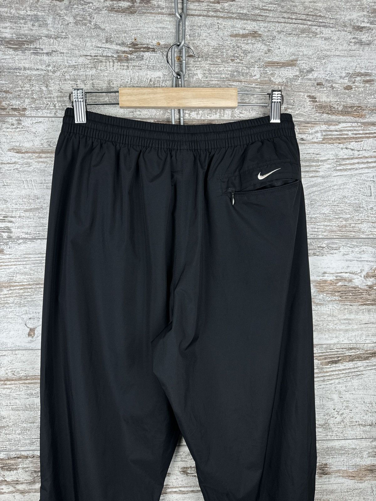 Vintage Mens Vintage Nike swoosh black pants sweatpants drill nylon Size US 32 / EU 48 - 12 Thumbnail