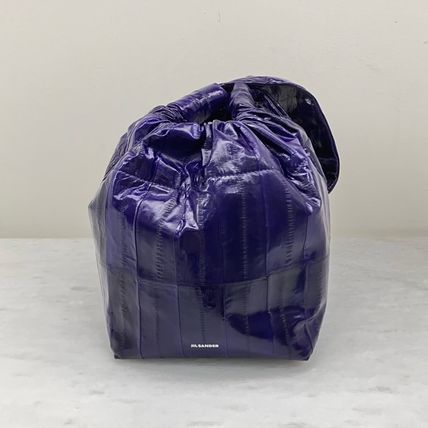 Jil Sander o1loc1c1124 Size: OS/ Wrist Strap Clutch Bag in Purple Size ONE SIZE - 1 Preview