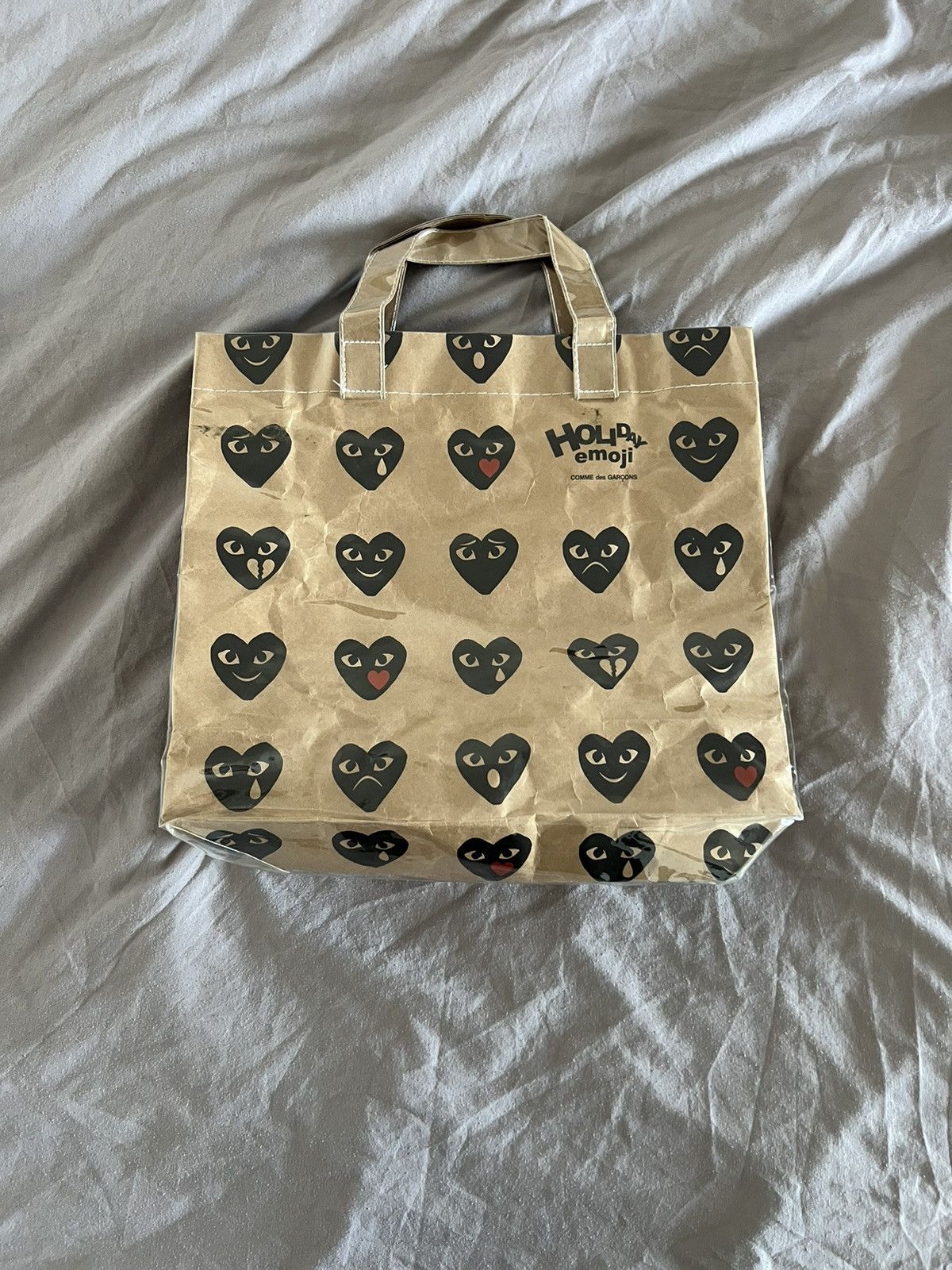Comme des Garcons PLAY Comme des Garçons Play Holiday Emoji Paper/PVC Tote Bag Size ONE SIZE - 1 Thumbnail