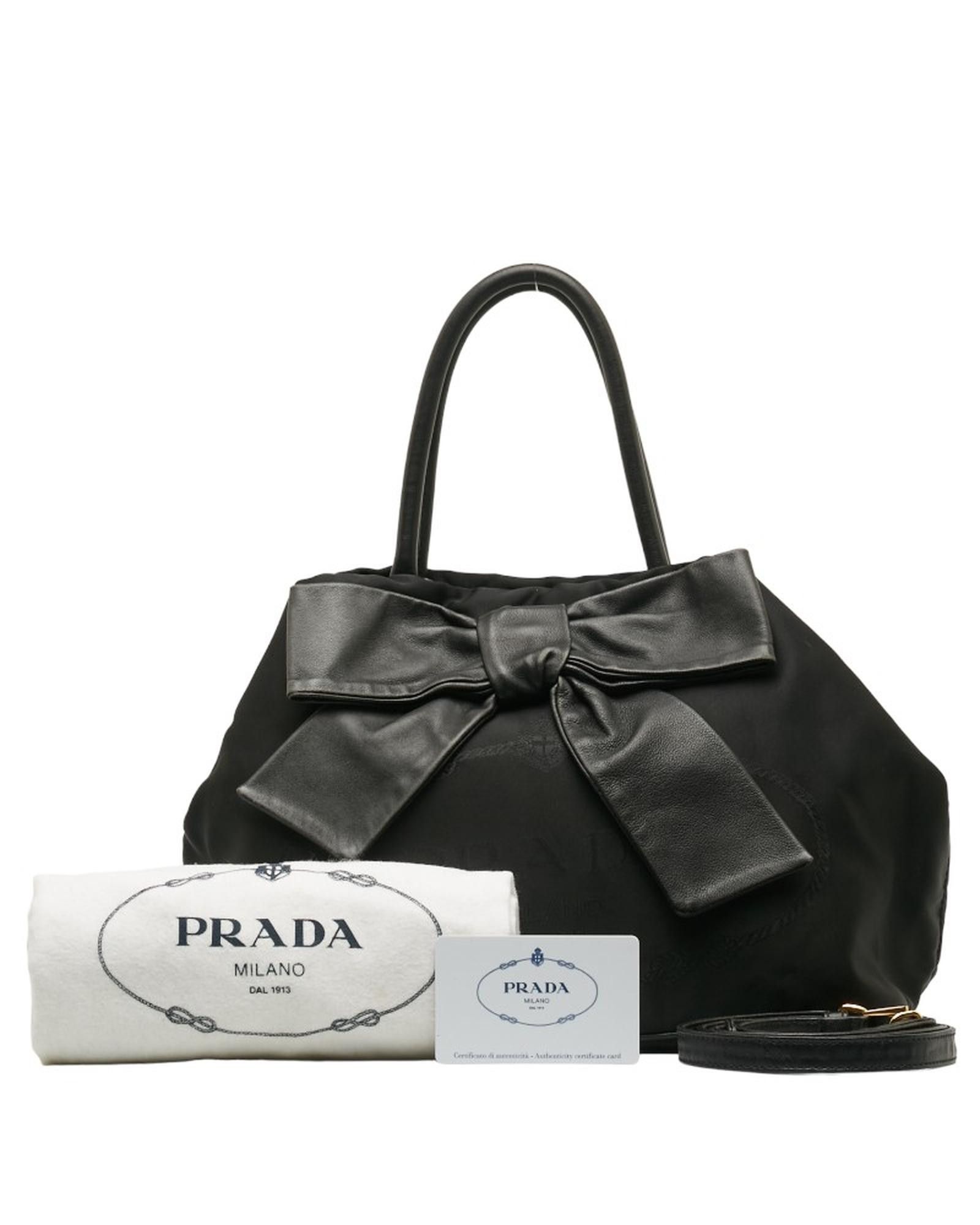 image of Prada Logo Bow Handbag In Black Canapa Fabric, Women's