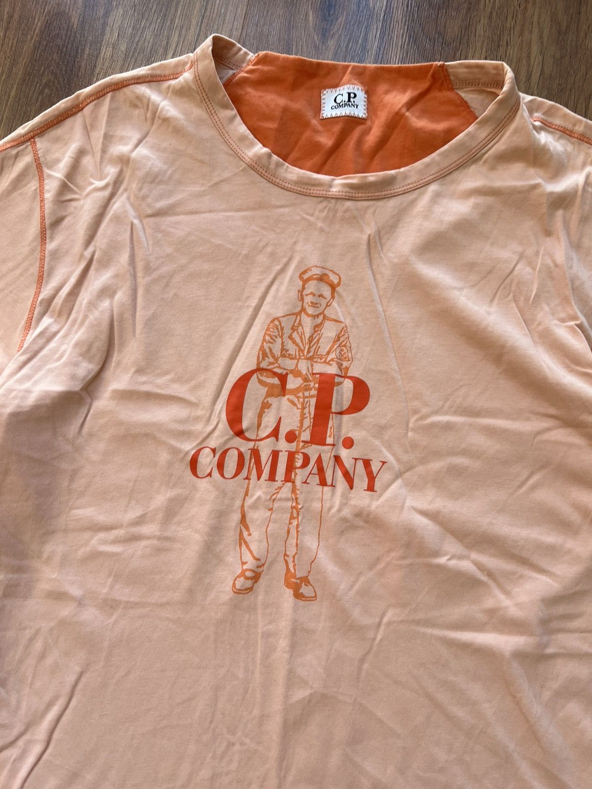 C.P. Company C.P. Company Graphic Logo T-Shirt — Light Peach / Size M Size US M / EU 48-50 / 2 - 4 Thumbnail