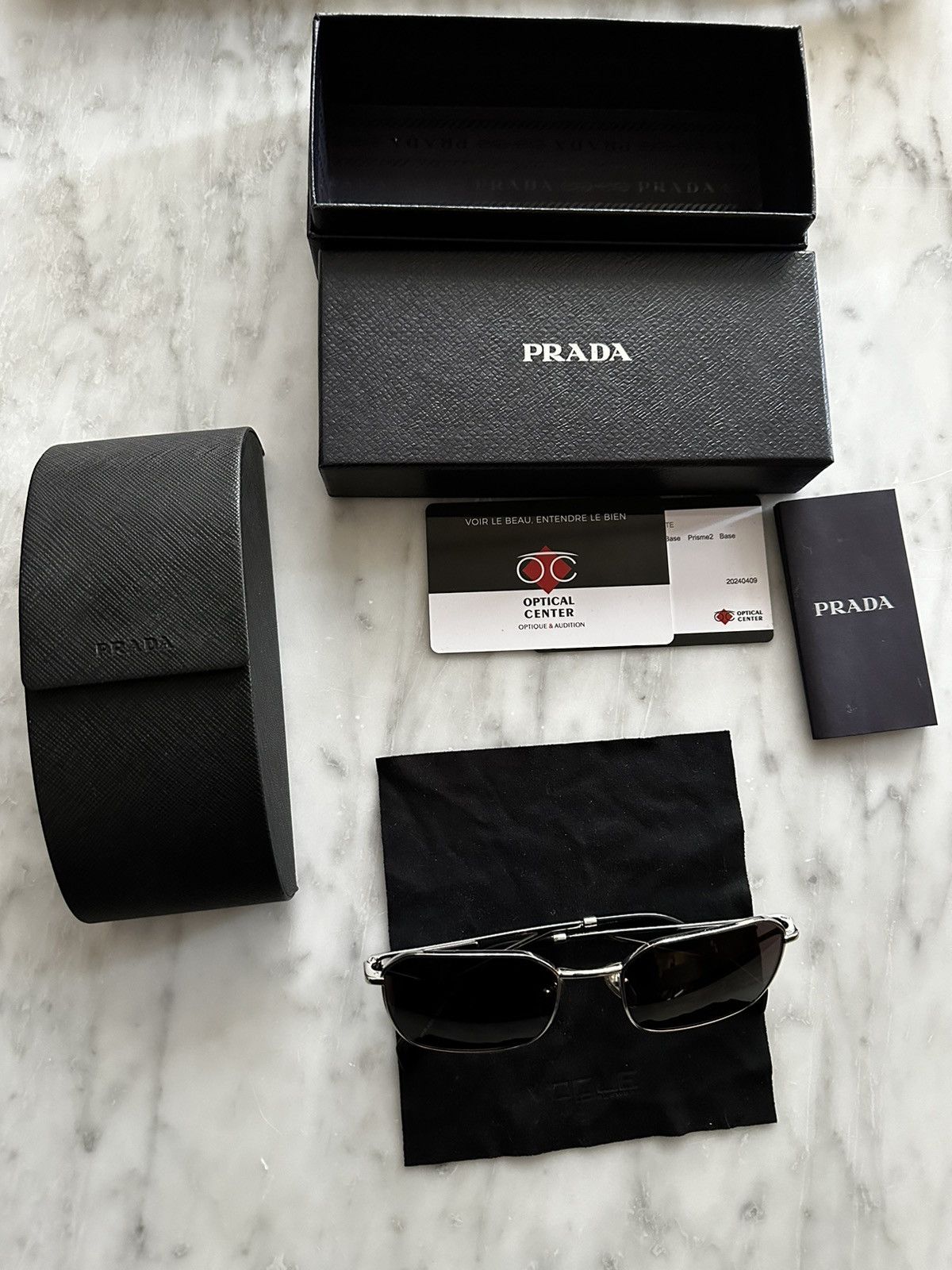 Prada NEVER WORN PRADA SUNGLASSES SILVER WITH BLACK GLASSES UNISEX Size ONE SIZE - 1 Thumbnail