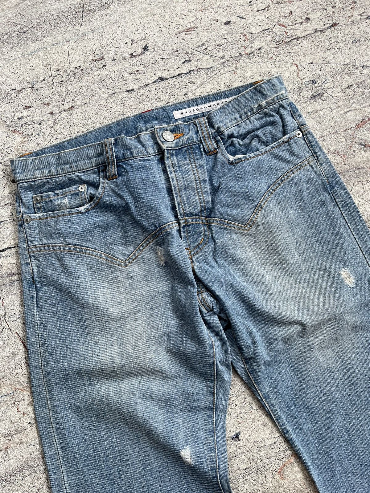 Sunao kuwahara distressed jeans by issey miyake