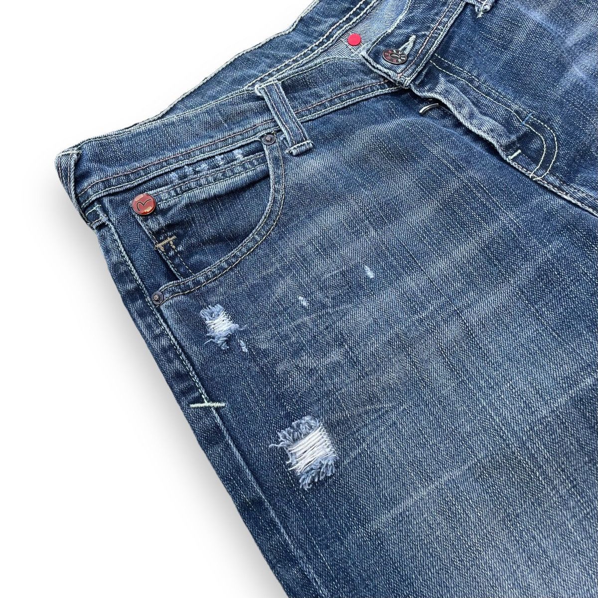 VINTAGE Y2K EVISU X PUMA DISTRESSED WASHED DENIM PANTS