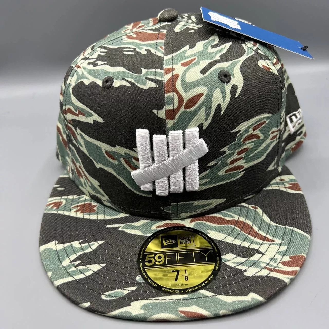 New Era Undefeated Hat Men 7 1/8 Camo 59Fifty New Era Fitted Cap New Size ONE SIZE - 1 Thumbnail