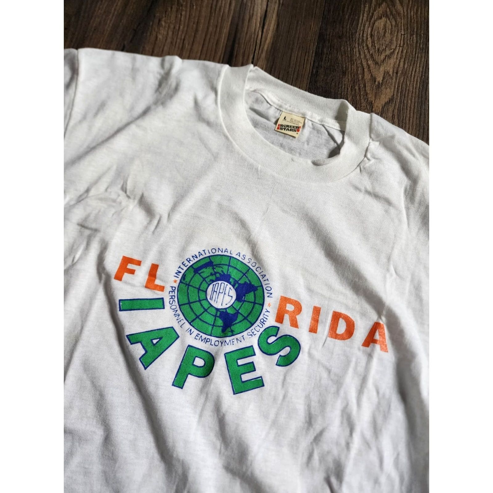 Vintage VINTAGE Screen Stars T-Shirt Unisex Adults Florida IAPES FL Union Workers Crew Neck Short Sleeve White Cotton Blend 1980s Logo Easy Care Size US L / EU 52-54 / 3 - 4 Thumbnail