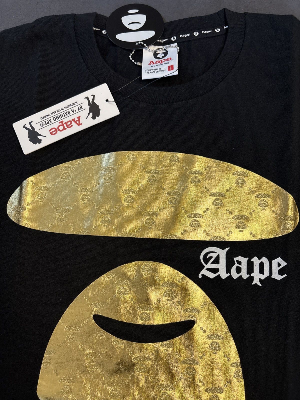 Aape × Bape Aape by a bathing ape black and gold tee Size US L / EU 52-54 / 3 - 11 Thumbnail