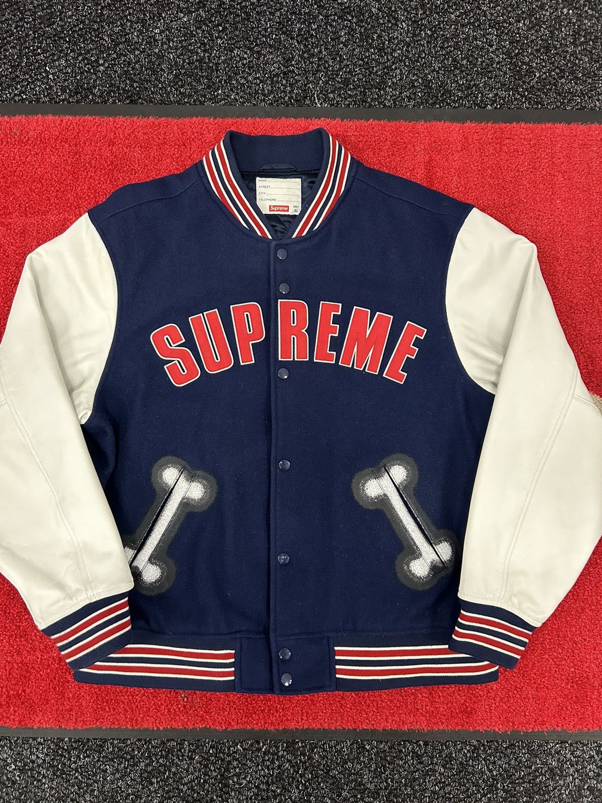 image of Supreme Bones Varsity Jacket Chito in Navy, Men's (Size XL)