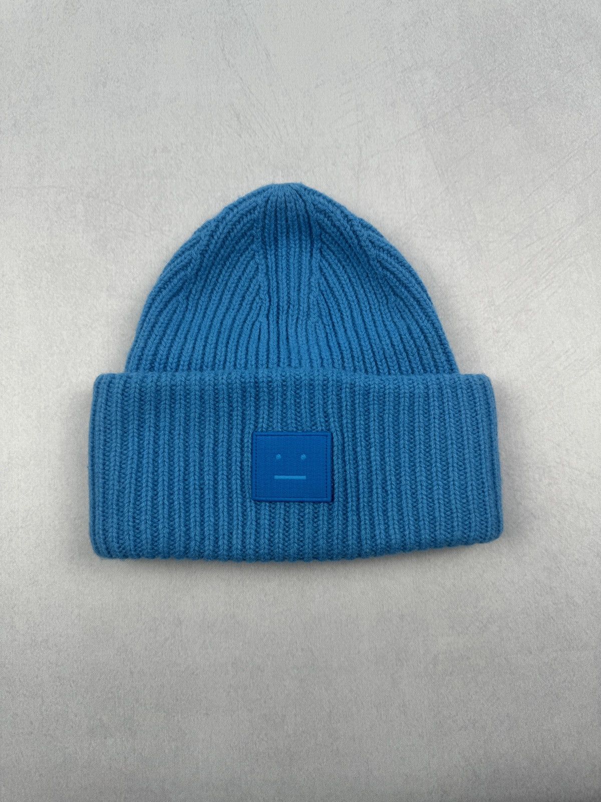 Pre-owned Acne Studios Pansy Face Knitted Wool Beanie Hat In Blue
