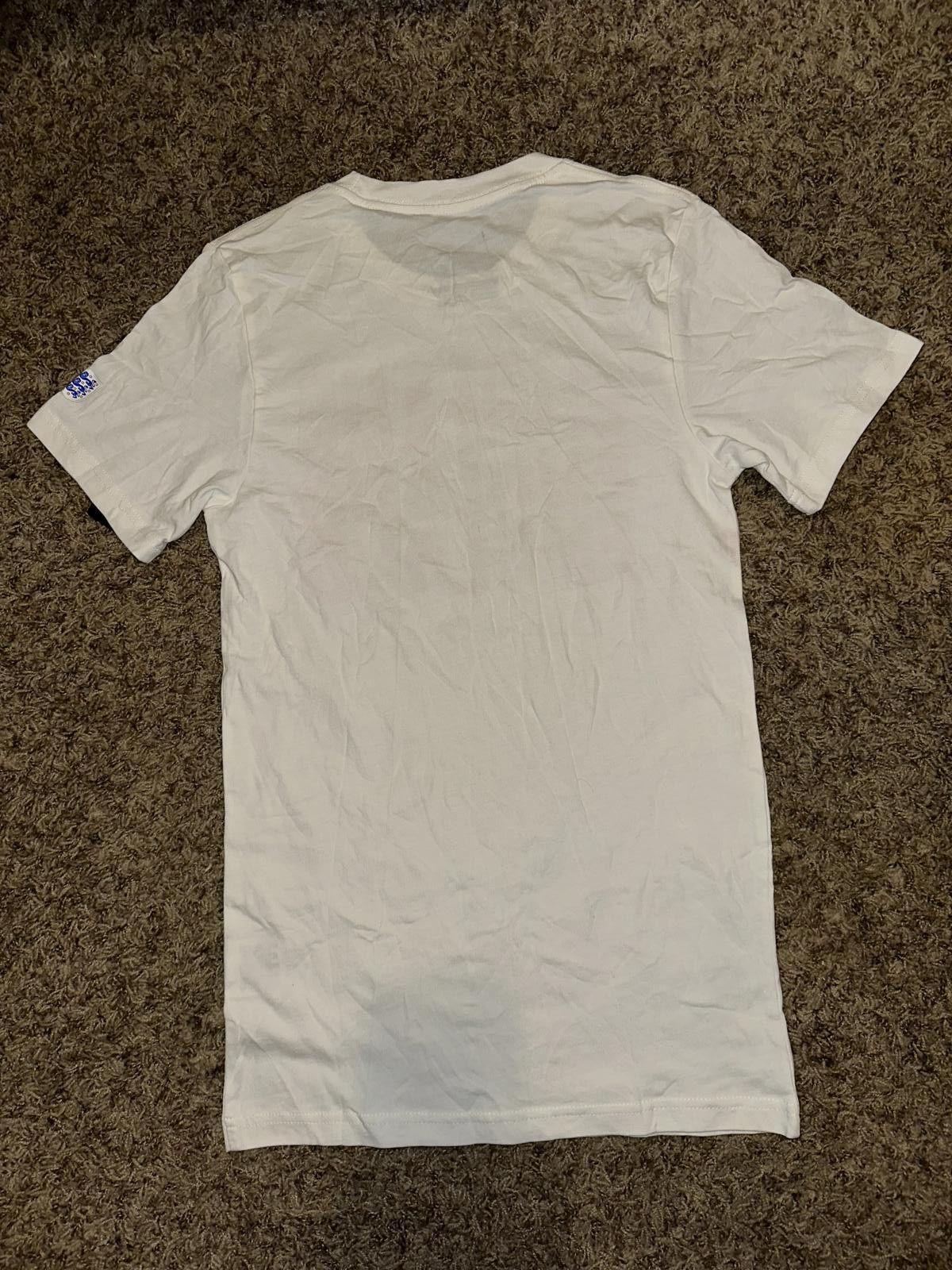 Nike Nike Men’s Core Type England National White Spellout Graphic Football/soccer Tee Size US S / EU 44-46 / 1 - 4 Thumbnail