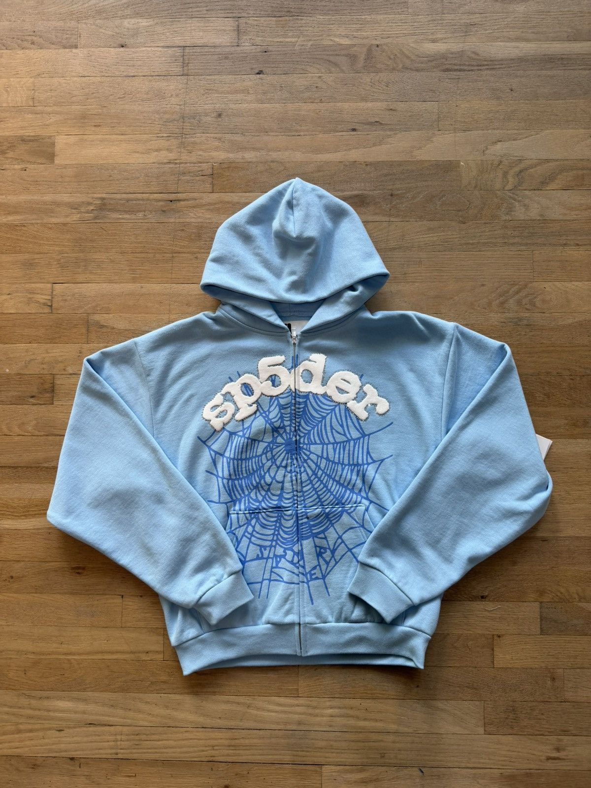 SP5DER パーカー ブルー Here is the Slime