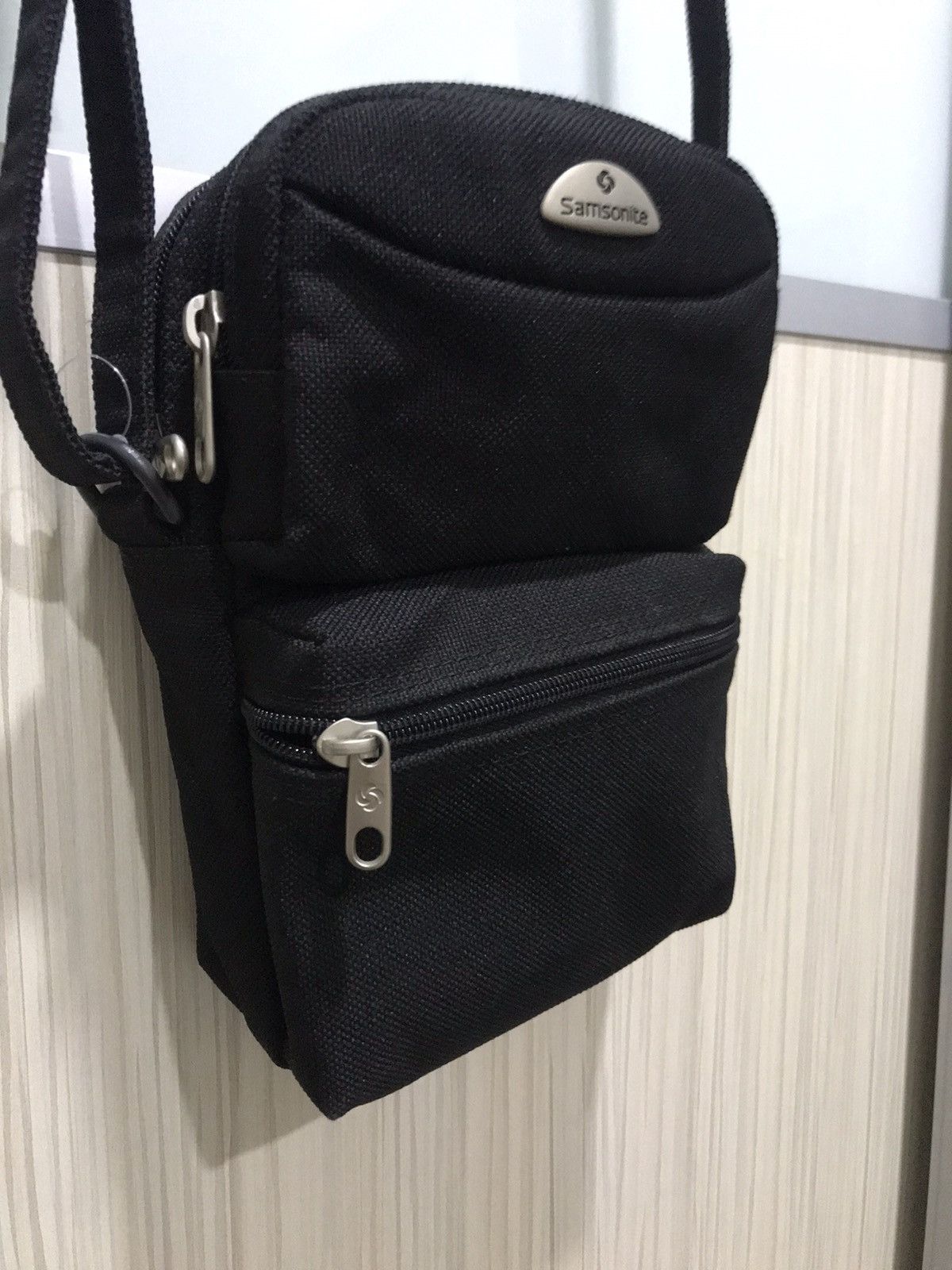 Samsonite sling best sale bag original price