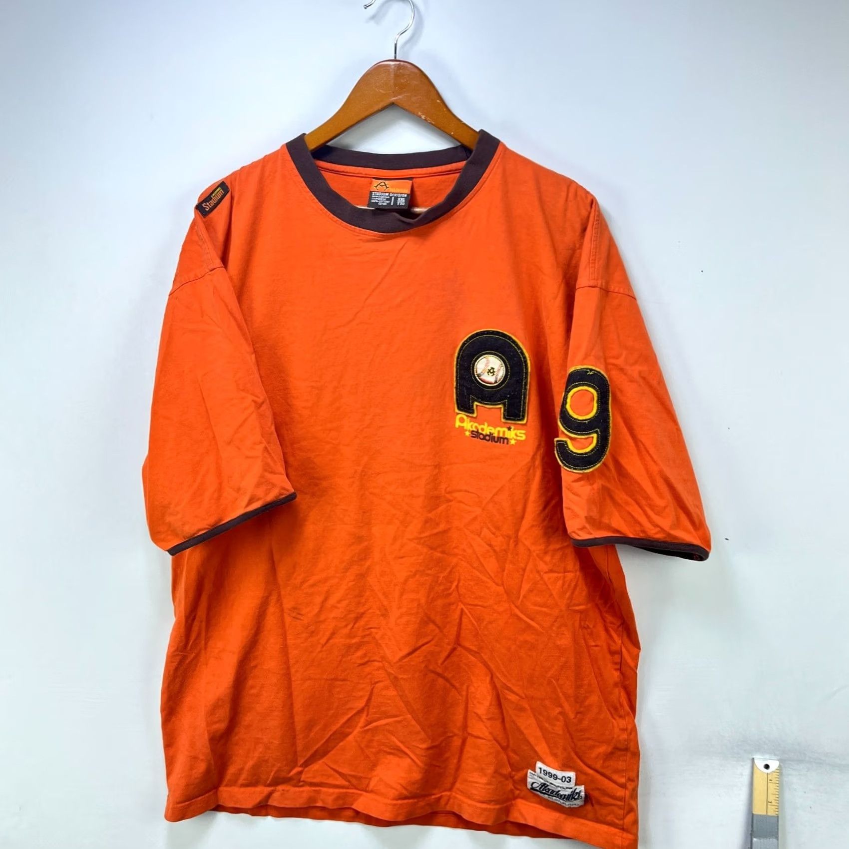 Akademiks VINTAGE Akademiks T-Shirt 2XL Men Orange 90s Hip Hop Stadium Graphic Print Short Sleeve Crew Neck Matte Finish Logo Embroidered 2000-2009 Size US XXL / EU 58 / 5 - 3 Thumbnail