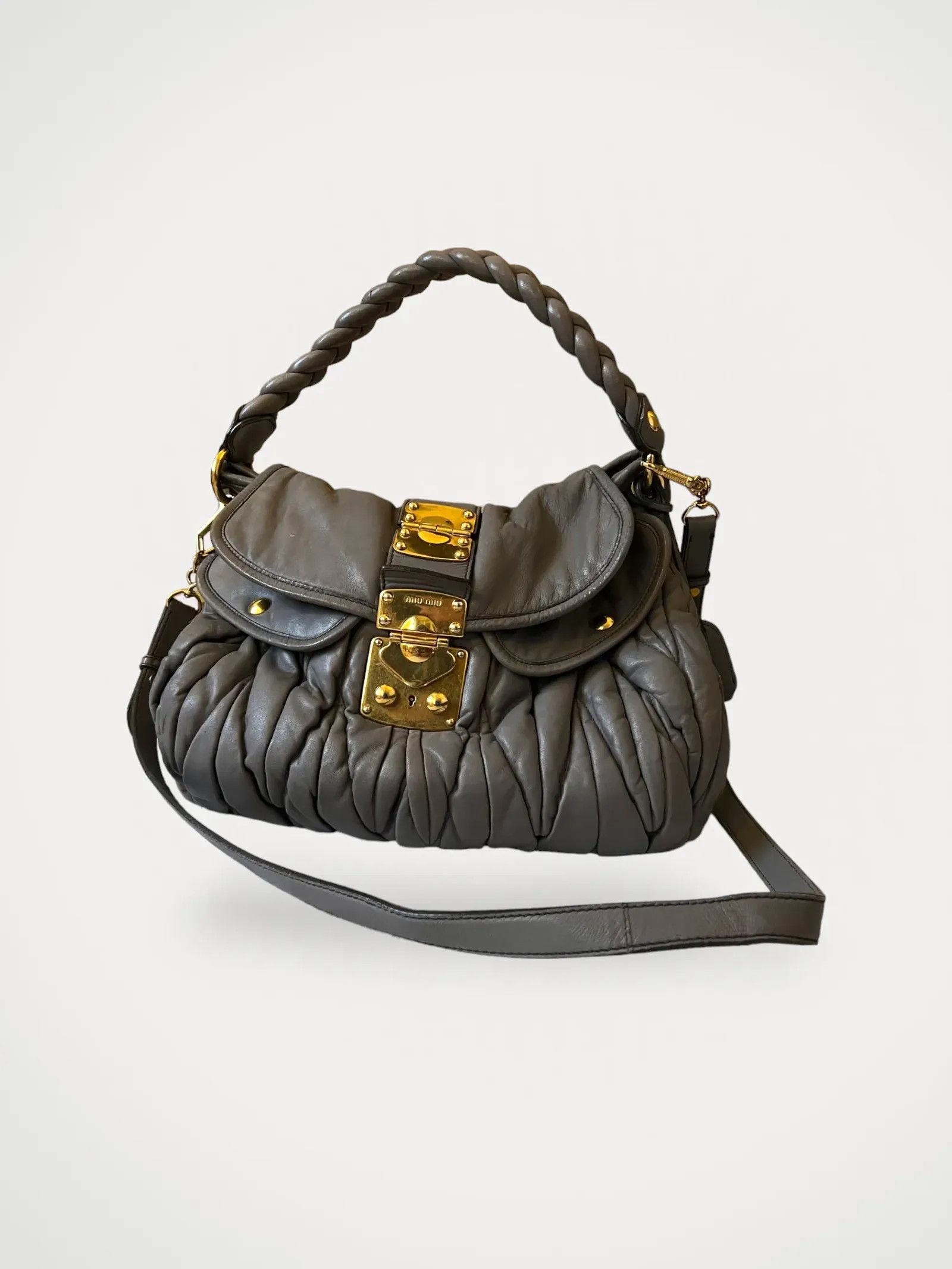 image of Miu Miu Matelasse Bucket Bag in Beige, Women's