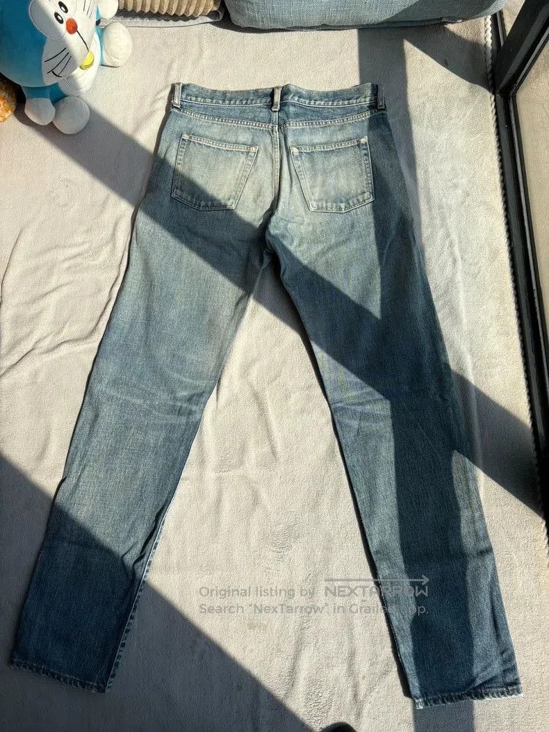 Saint Laurent D18 Washed Denim Jeans.