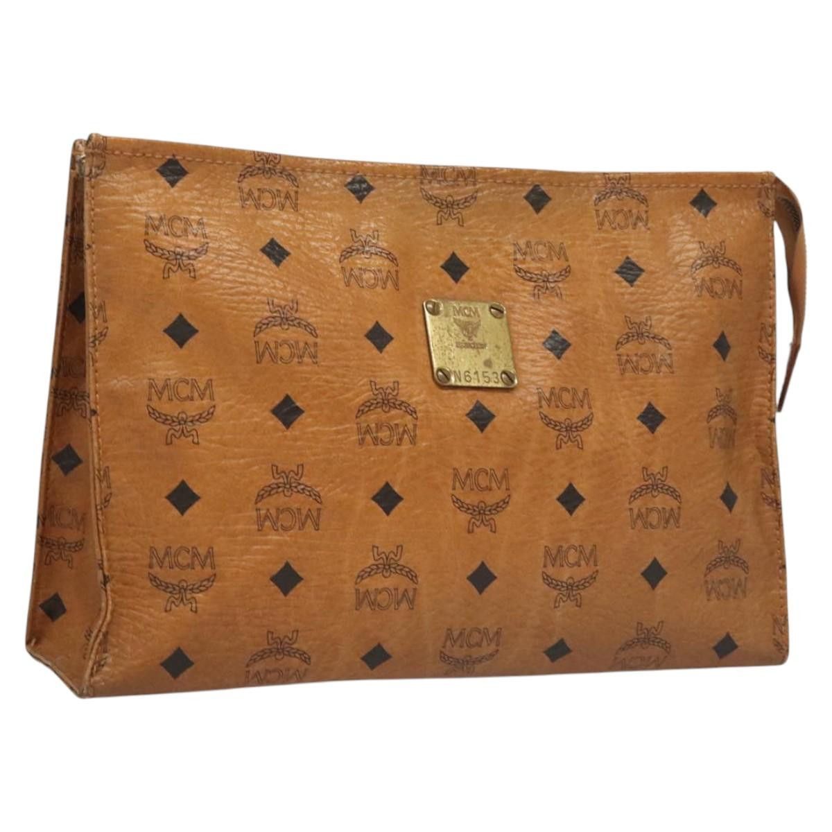 MCM Logogram Vicetos Clutch Bag PVC Leather Brown Gold Auth bs24802