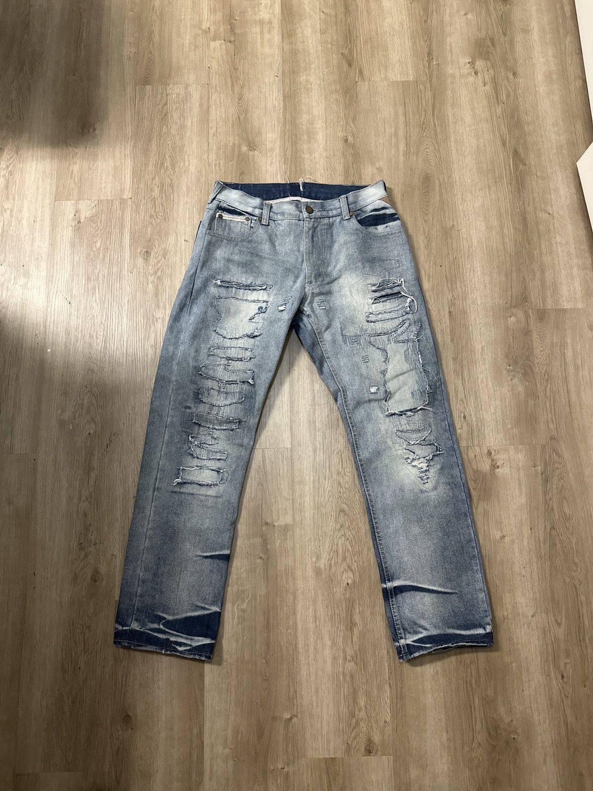 VINTAGE DISTRESSED DENIM JEANS