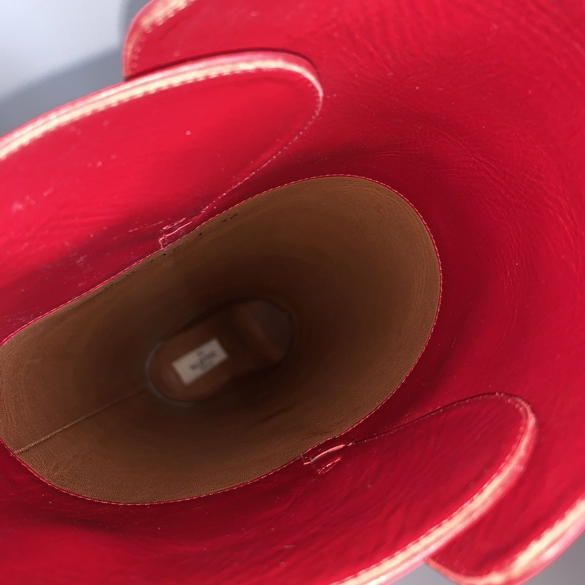 Red calfskin knee boots