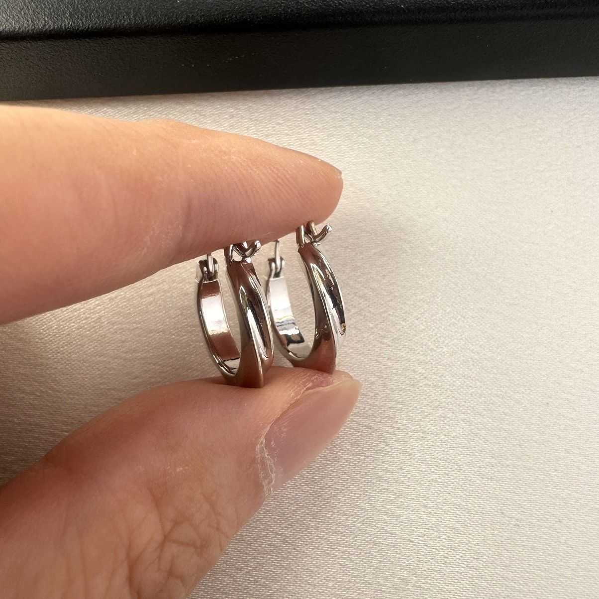 Designer Twisted Silver Hoop Earrings for Women Size ONE SIZE - 4 Thumbnail