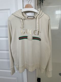 The sweatshirt Gucci with a tiger and Blind for Love by Taylor