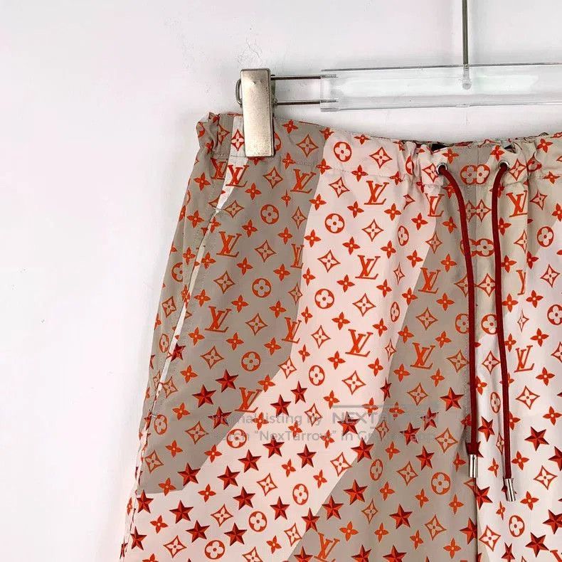 Louis Vuitton Pink Logo Star Print Shorts.