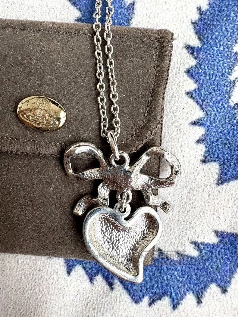 Vivienne Westwood Vivienne Westwood Crystal Bow Heart Necklace. Size ONE SIZE - 4 Thumbnail
