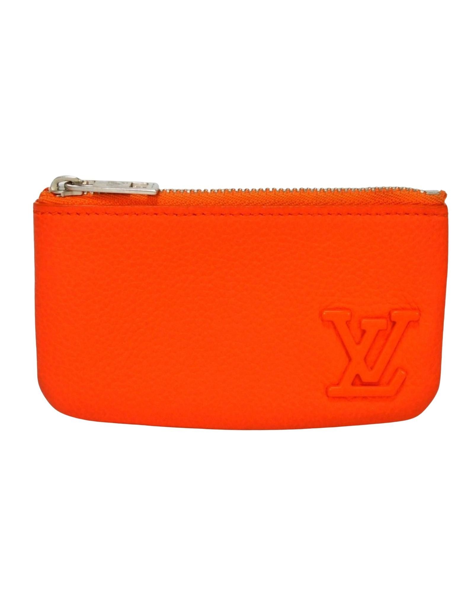 image of Louis Vuitton Embossed Leather Coin Purse in Orange, Men's