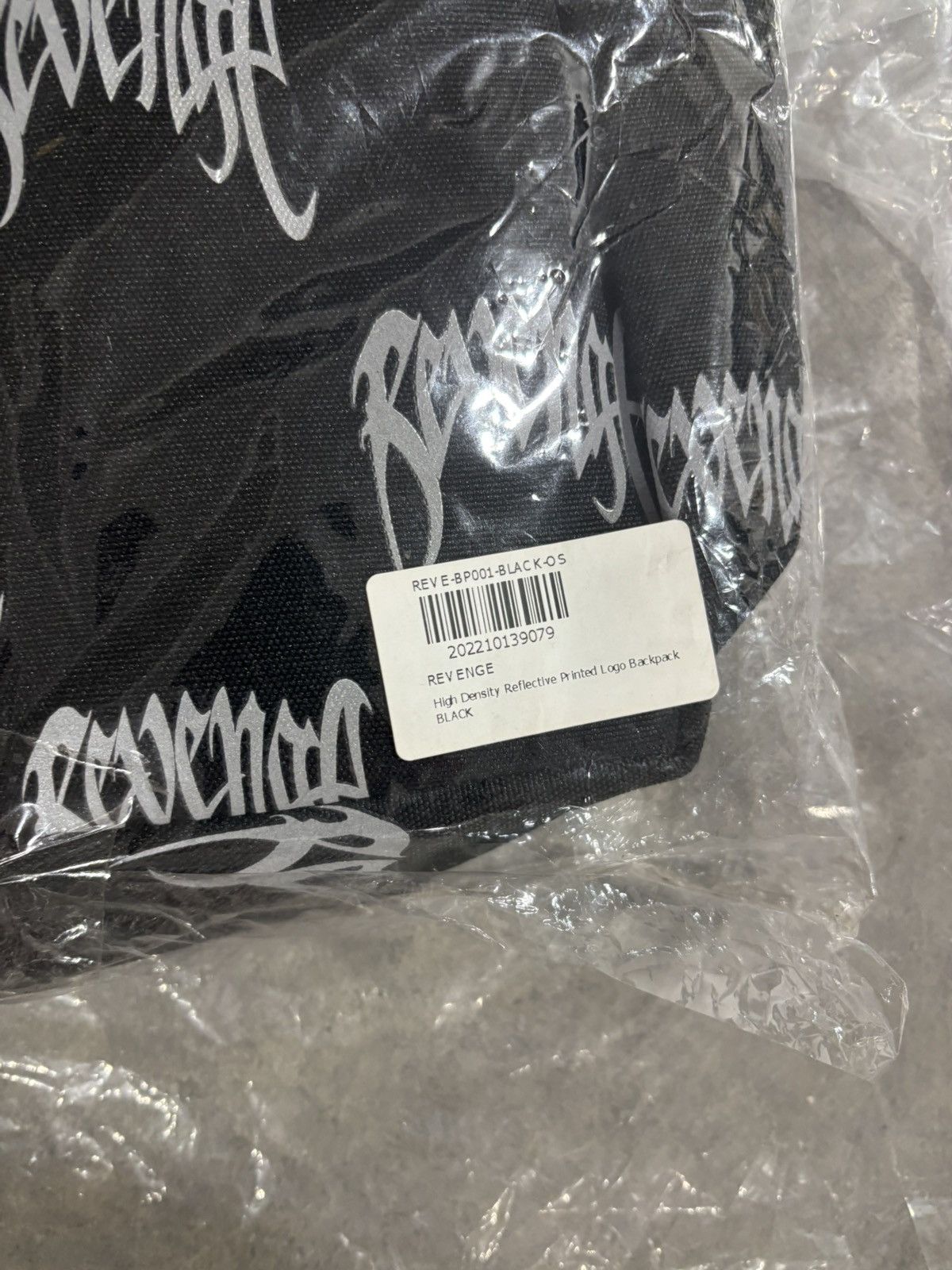 Revenge Allover Reflective Logo Backpack