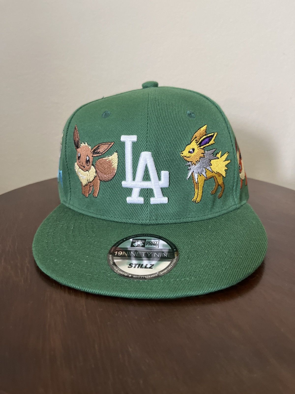 image of Stillz Pokemon Eevee Evolution (7 3/8) in Green, Men's