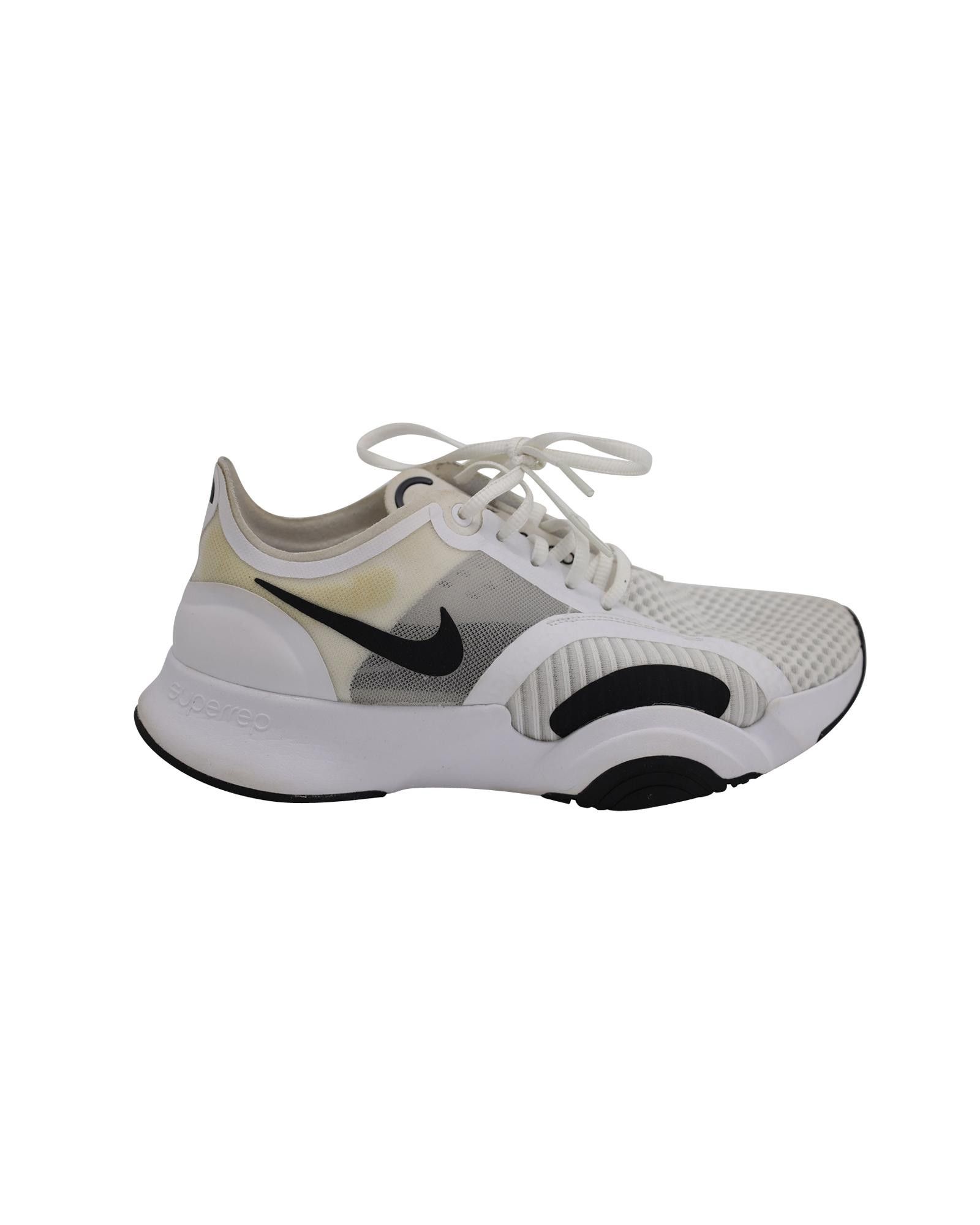 image of Nike Breathable White Polyester Training Shoes With Cushioned Midsoles And Rubber Outsole, Women's 
