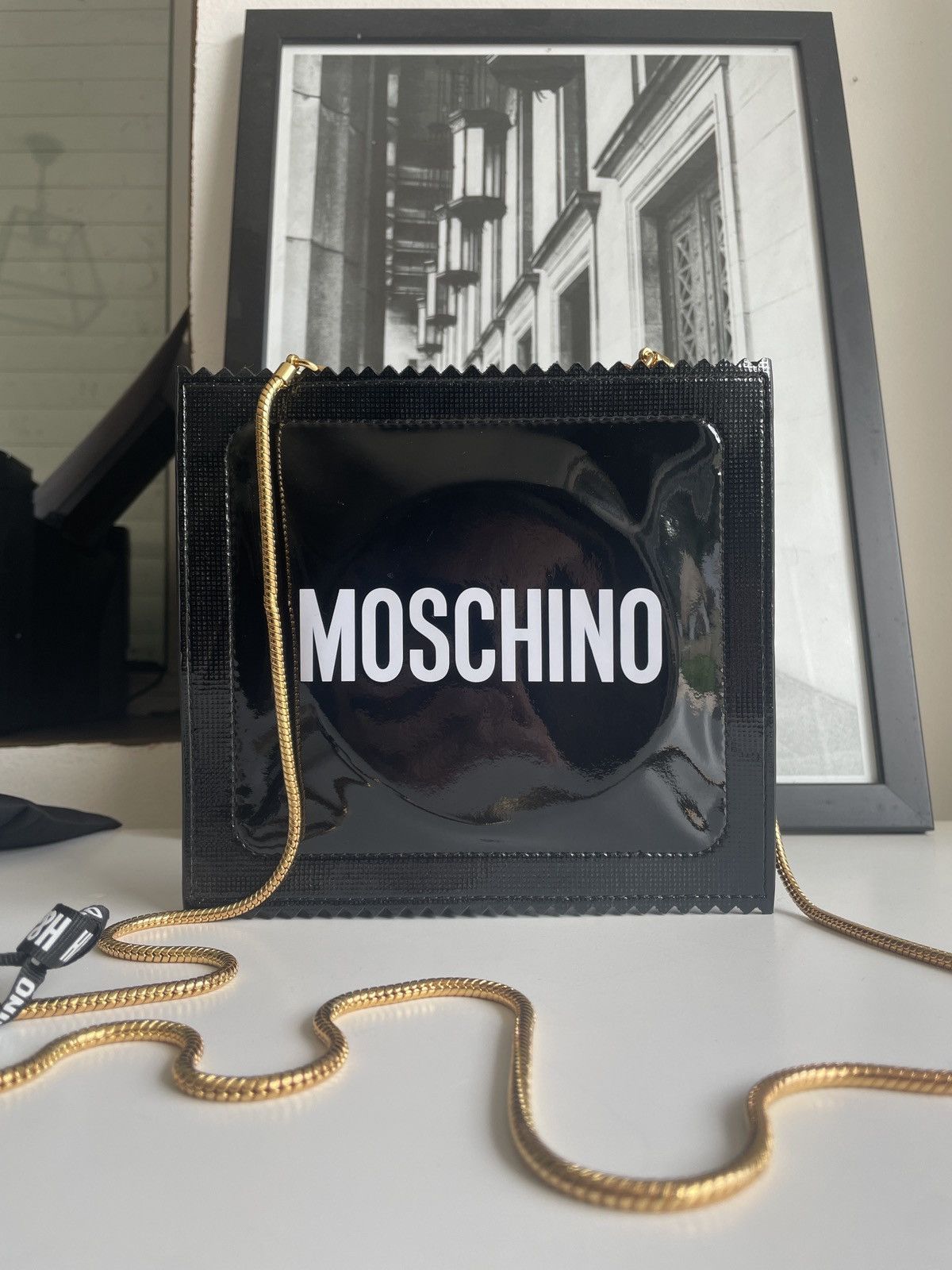 H M Moschino H MOSCHINO condom clutch bag Grailed