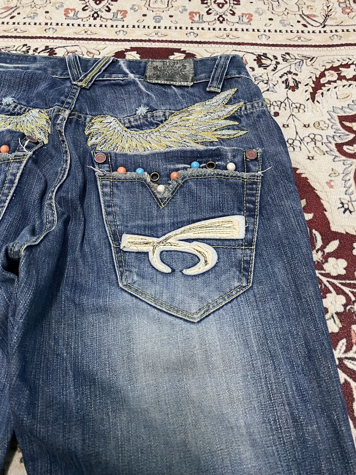 Japanese Brand X Red pepper distressed flare jeans