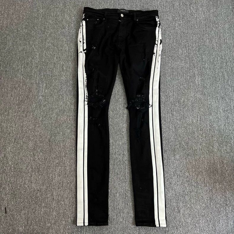 Amiri side white stripe distressed denim jeans