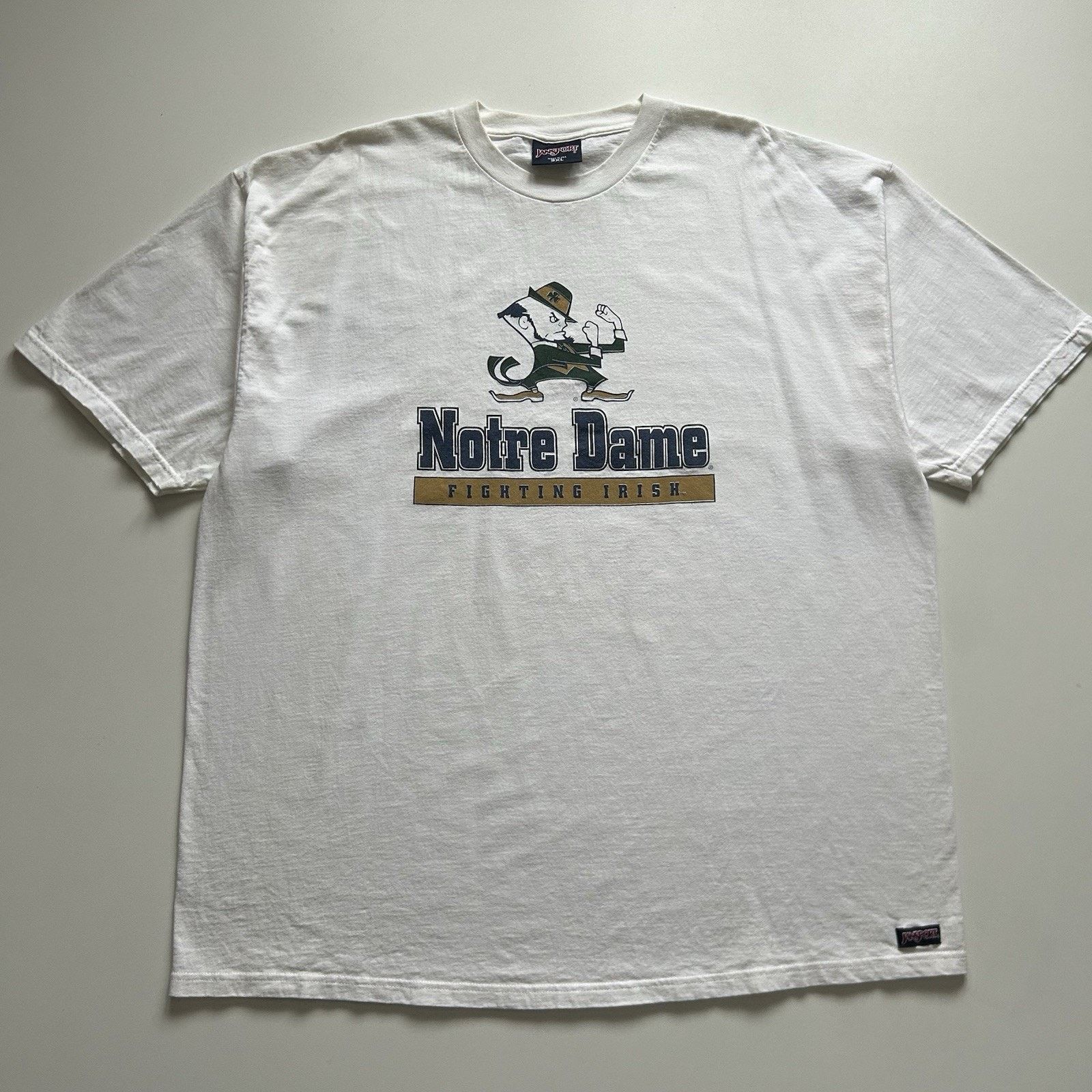 Jansport × NCAA × Vintage Vintage Notre Dame T-Shirt 3XL 90s NCAA Fighting Irish Rare Size US XXL / EU 58 / 5 - 1 Thumbnail