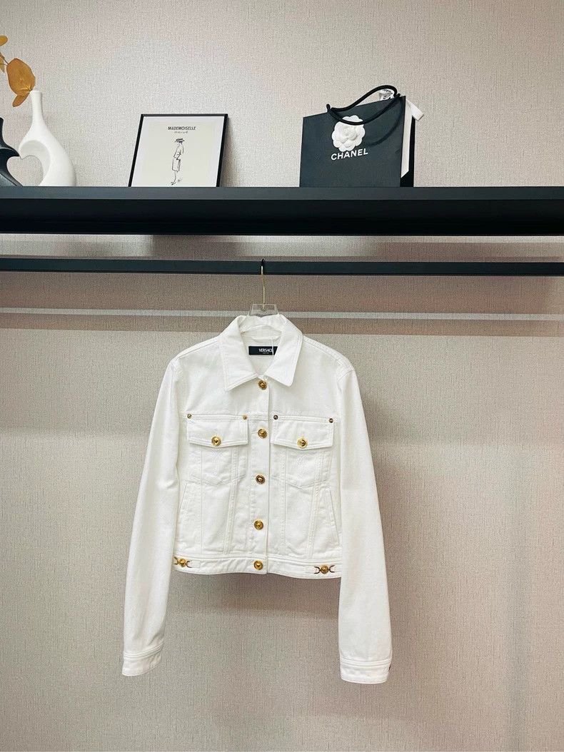Versace A cropped denim jacket with white gold buckles