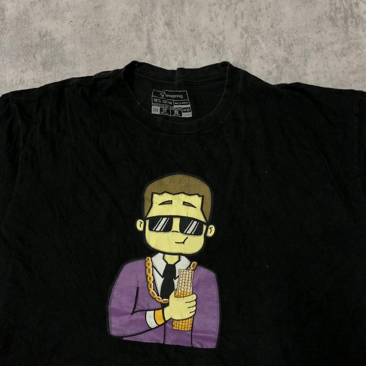 Other Black graphic tee with a bold cartoon design Size US XXL / EU 58 / 5 - 3 Thumbnail