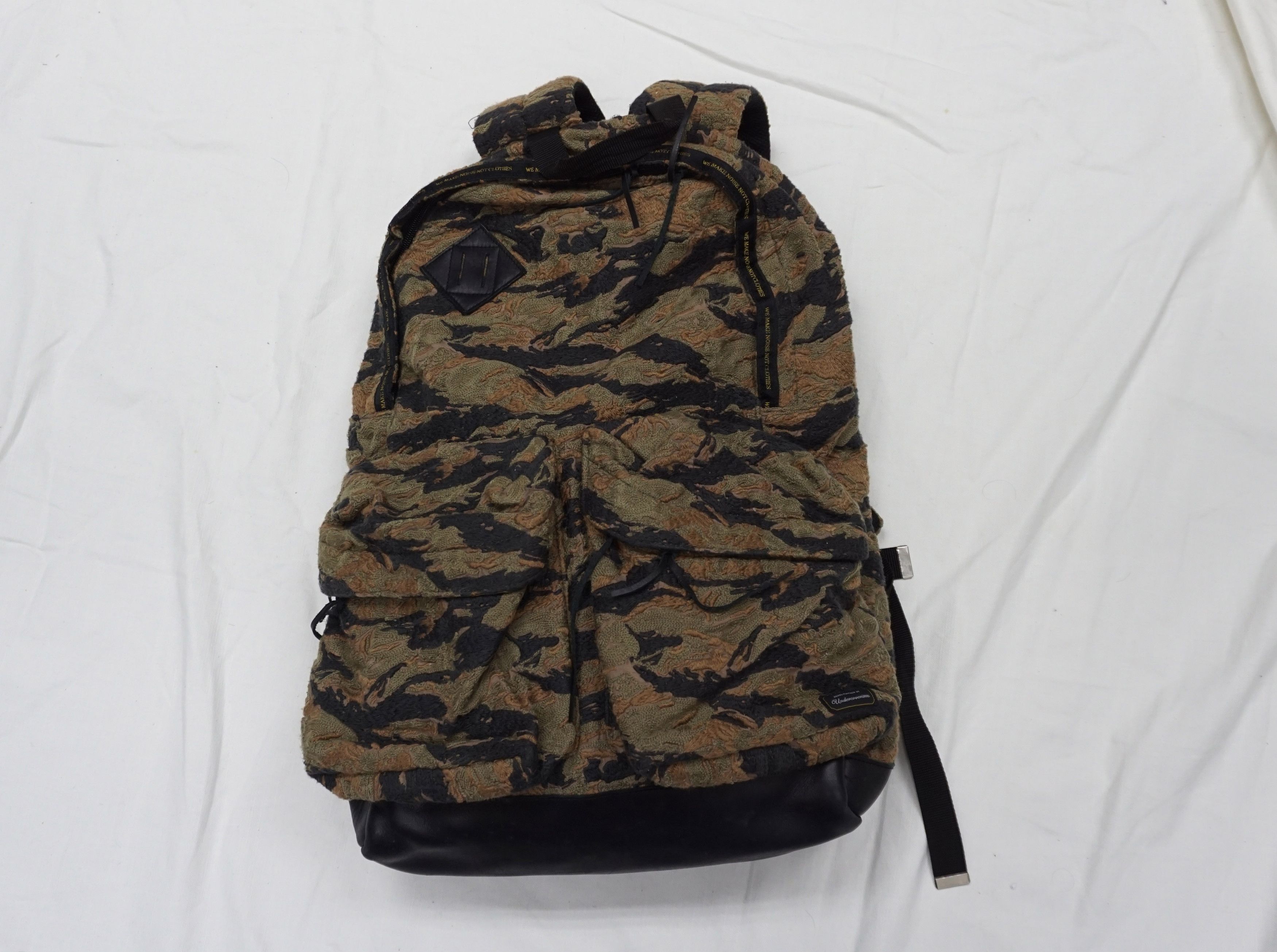 image of Art x Undercover Embroidered Camo Backpack, Men's