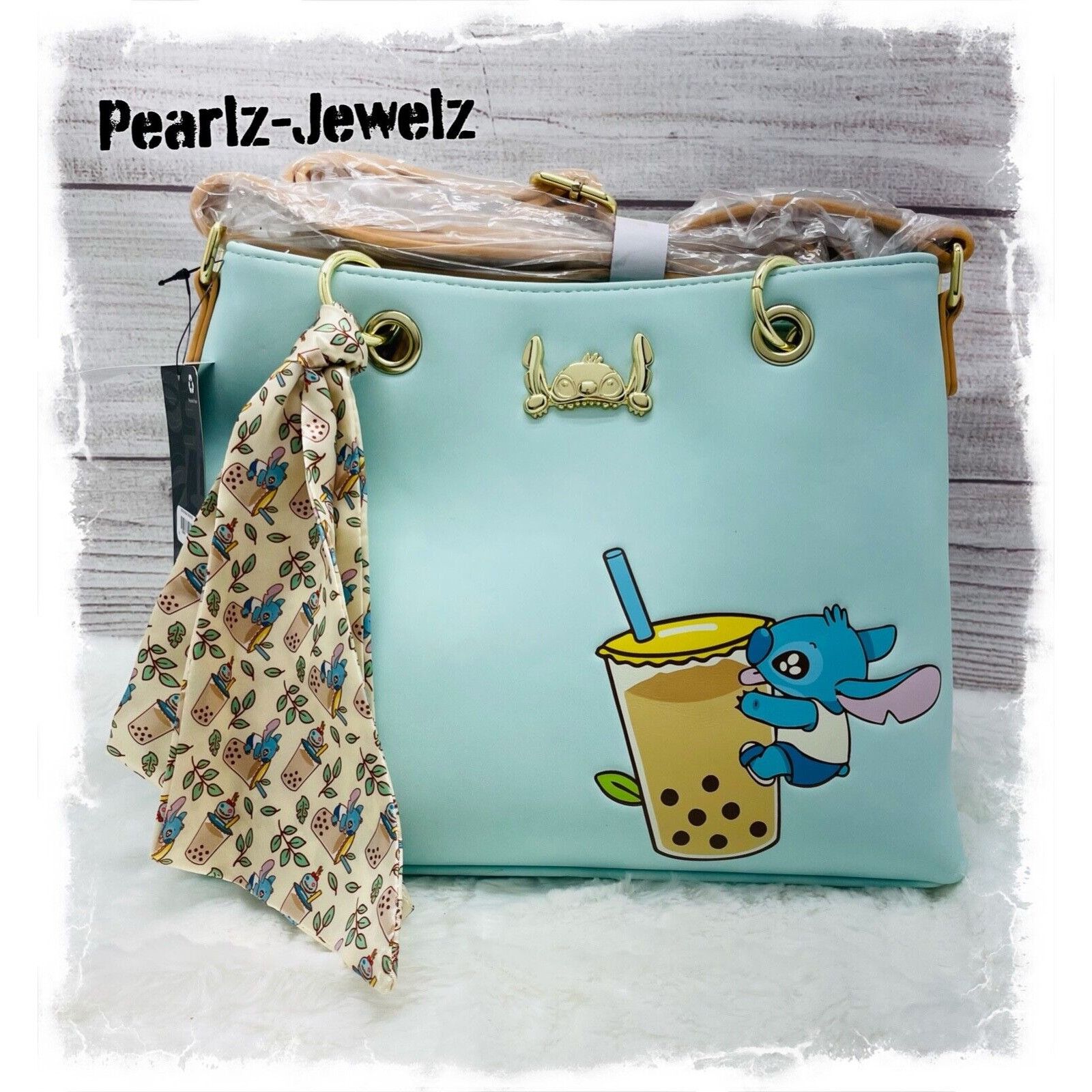 image of Loungefly Disney Lilo & Stitch Boba Blue Scarf Crossbody Bag, Women's